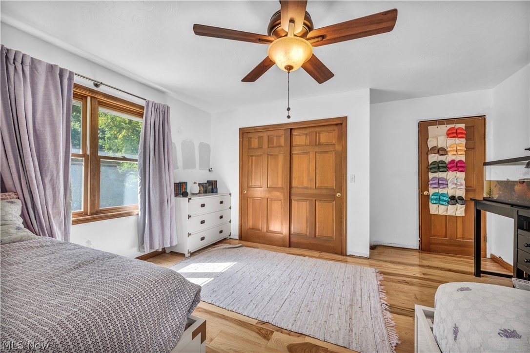 6730 Avon Belden Road North Ridgeville, OH 44039 - Photo 29 of 35 Bedroom with light hardwood floors and ceiling fan