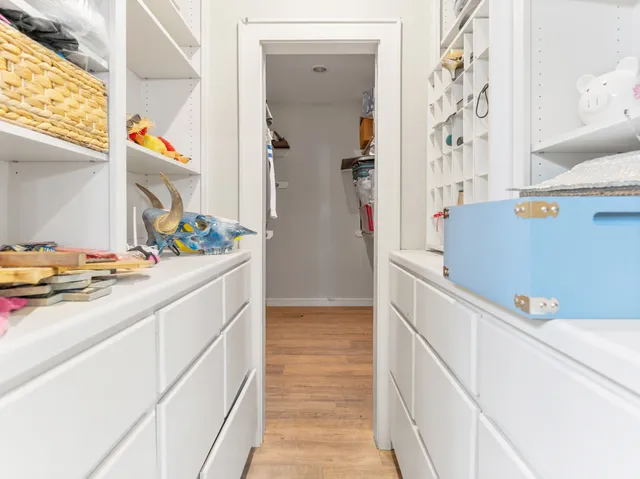 a hallway with washer and dryer