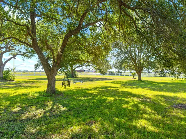 a view of swimming pool with an outdoor space and seating area