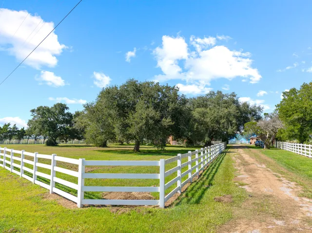 a view of a swimming pool with an outdoor space and seating area