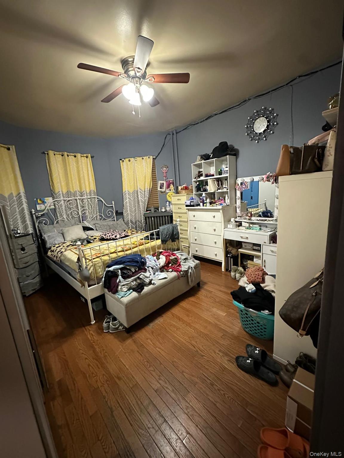 35-44 100th Street Queens, NY 11368 - Photo 4 of 4 a living room with furniture and kitchen view