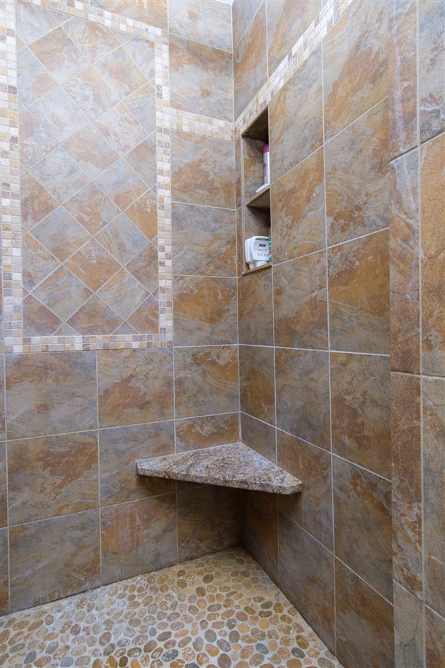 5121 Halley Road Rockford, IL 61101 - Photo 15 of 25 a bathroom with a sink toilet and shower