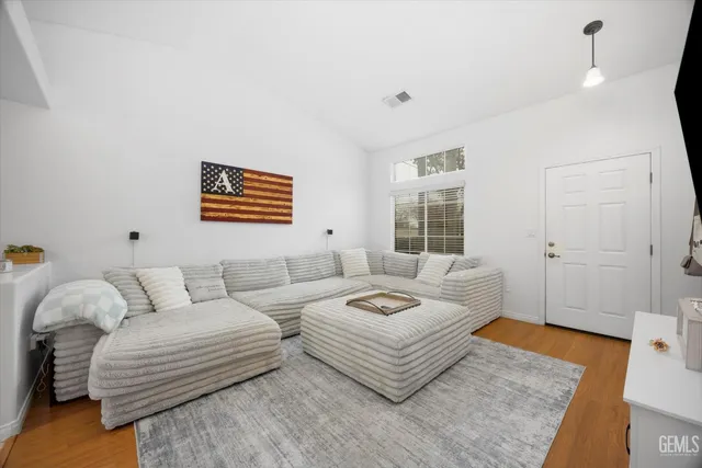 a living room with furniture and window
