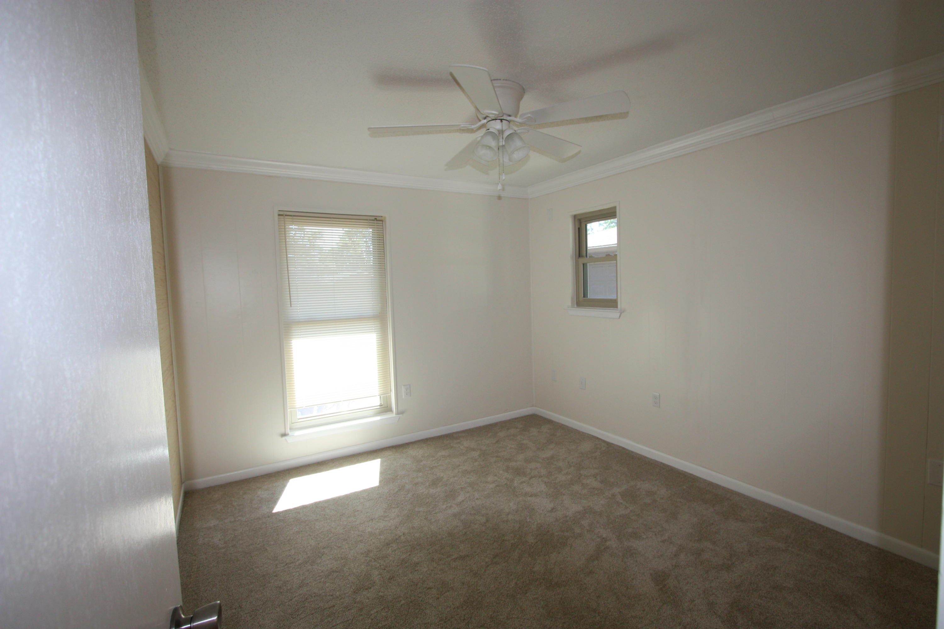 75 Country Club Road Shalimar, FL 32579 - Photo 14 of 24 an empty room that has a window