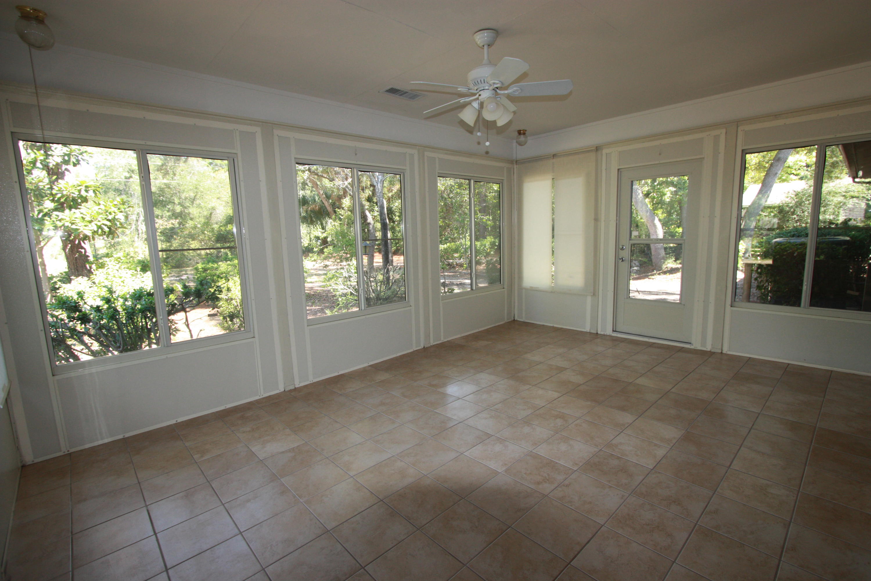 75 Country Club Road Shalimar, FL 32579 - Photo 15 of 24 a view of an empty room with a window