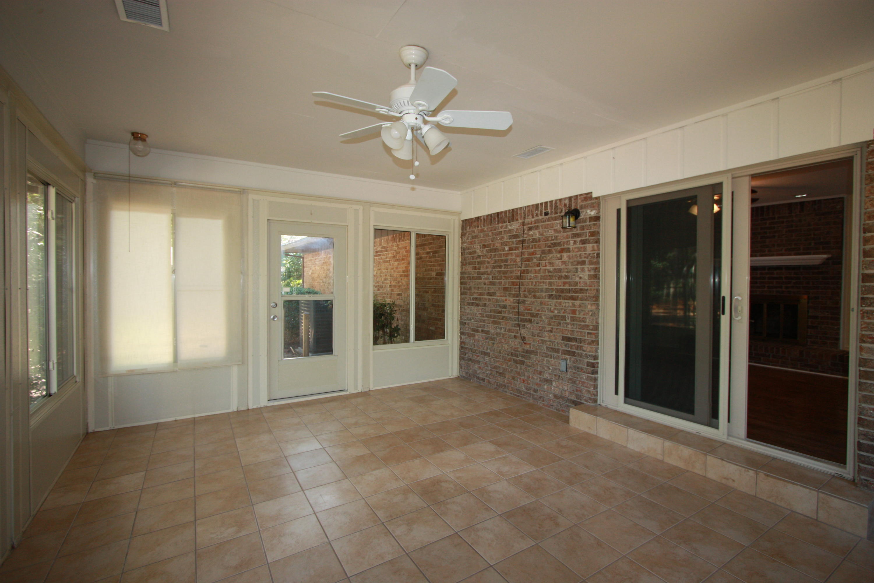 75 Country Club Road Shalimar, FL 32579 - Photo 16 of 24 a view of an empty room with a window