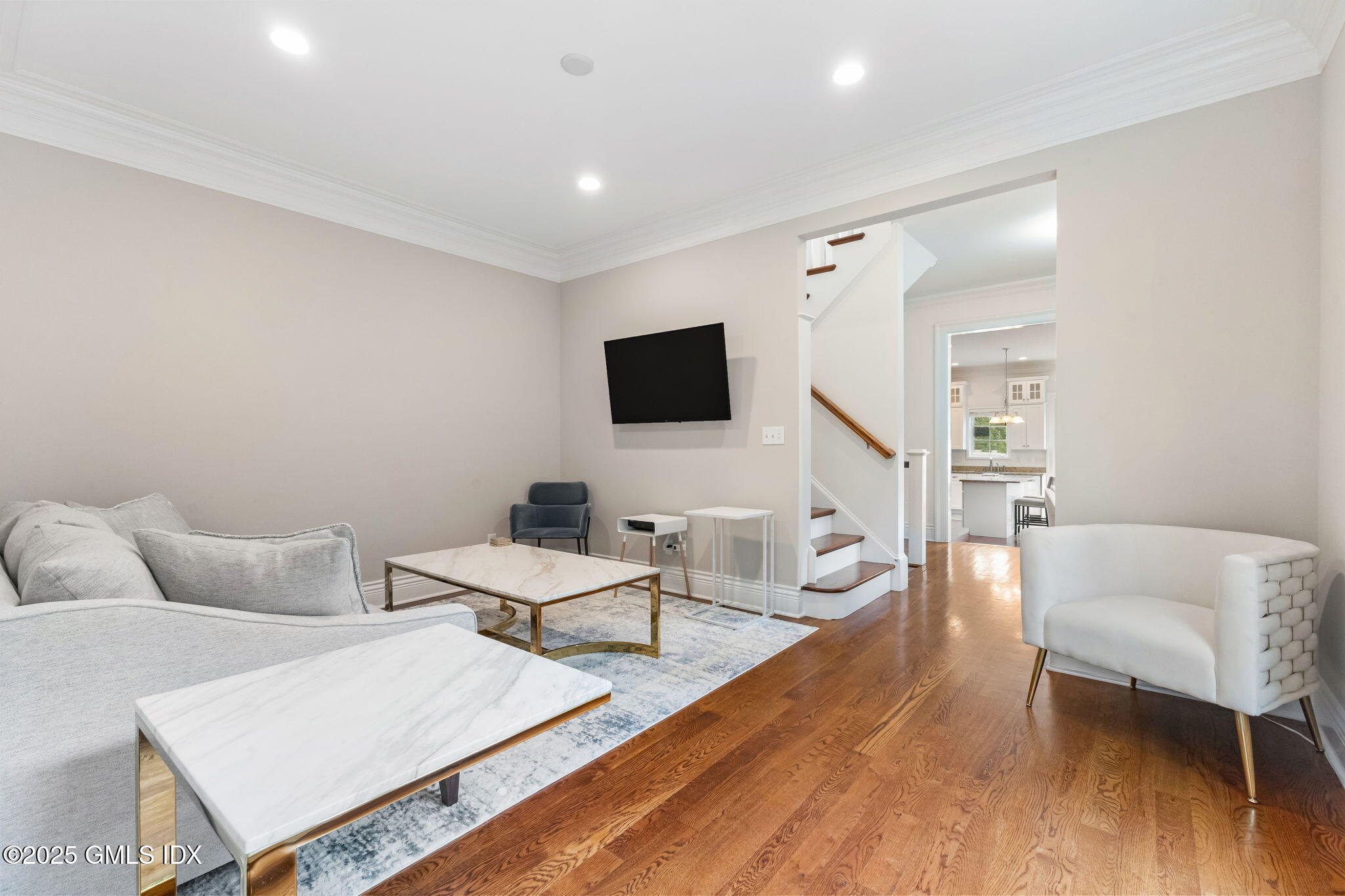 26 Church Street, Unit B Greenwich, CT 06830 - Photo 12 of 30 a living room with furniture and a flat screen tv