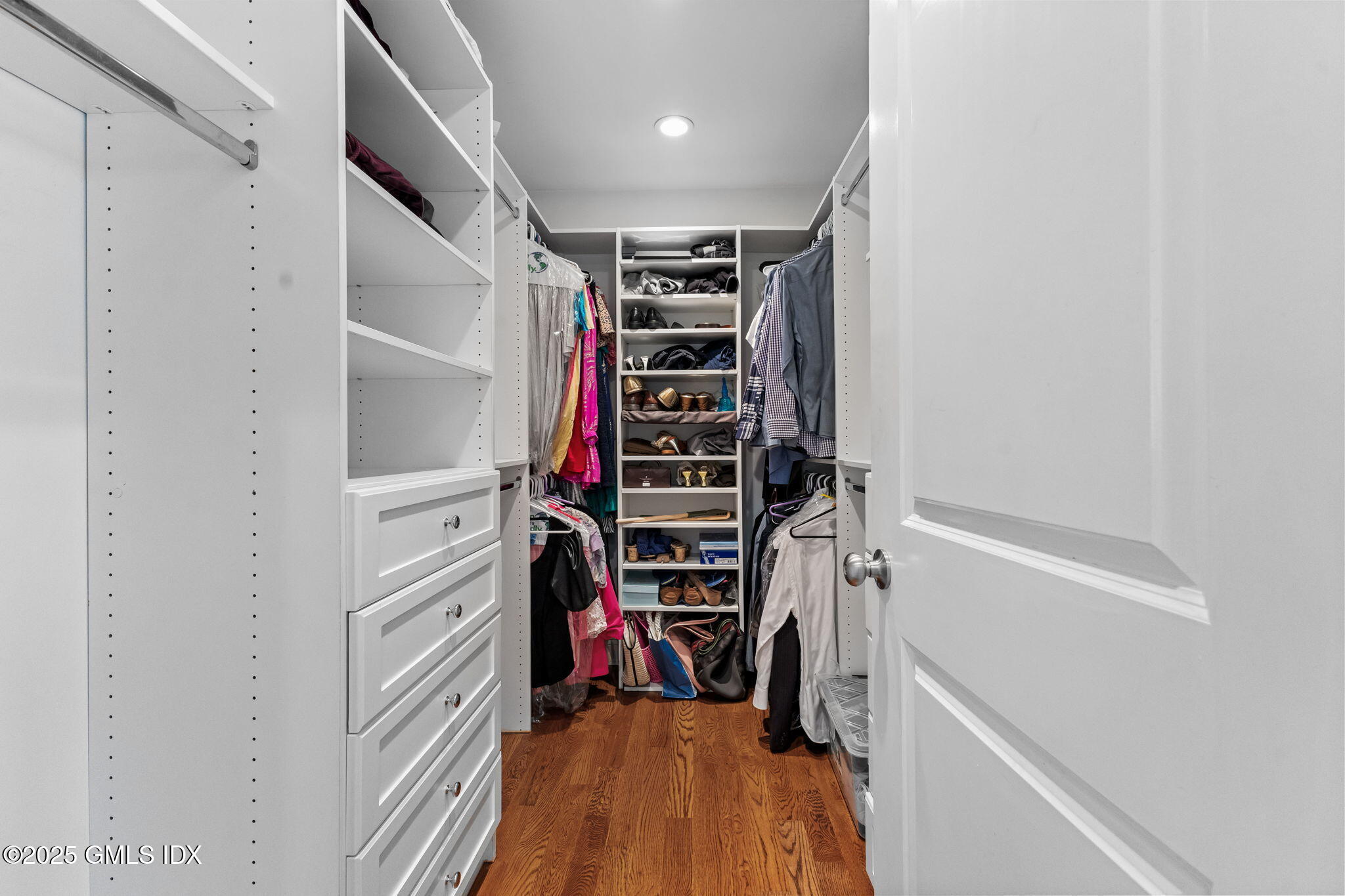 26 Church Street, Unit B Greenwich, CT 06830 - Photo 20 of 30 a view of walk in closet with clothes