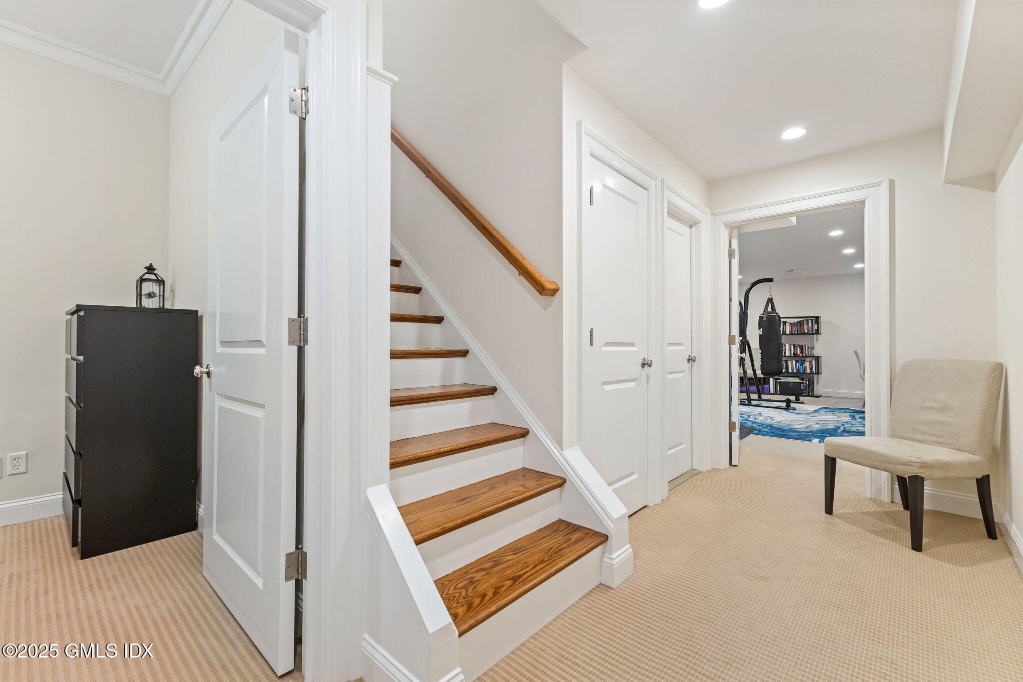 26 Church Street, Unit B Greenwich, CT 06830 - Photo 24 of 30 a view of hallway with stairs and wooden floor