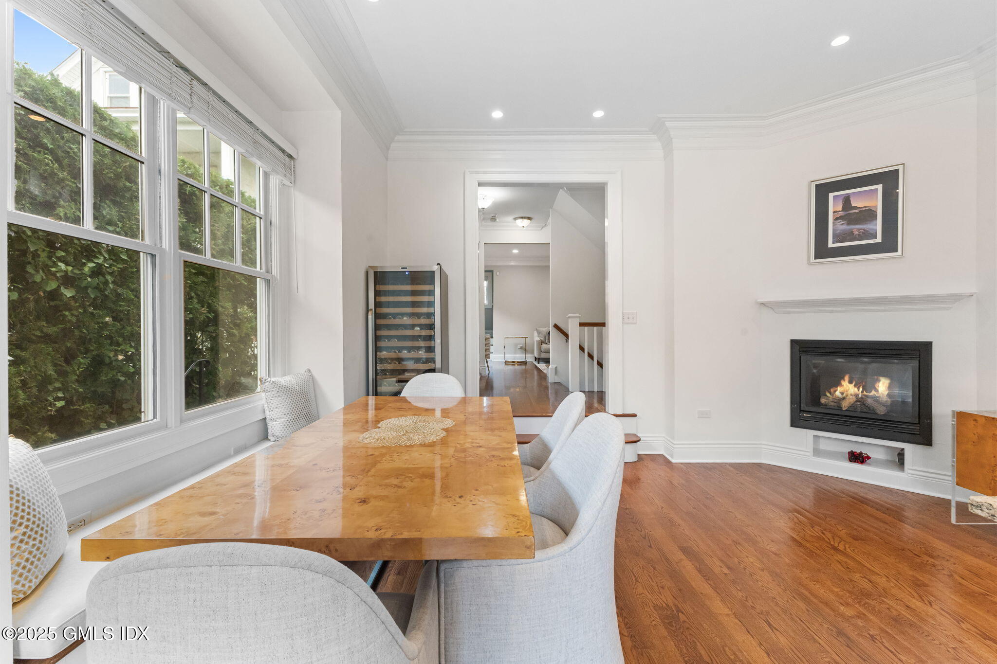 26 Church Street, Unit B Greenwich, CT 06830 - Photo 9 of 30 a living room with furniture and a fireplace