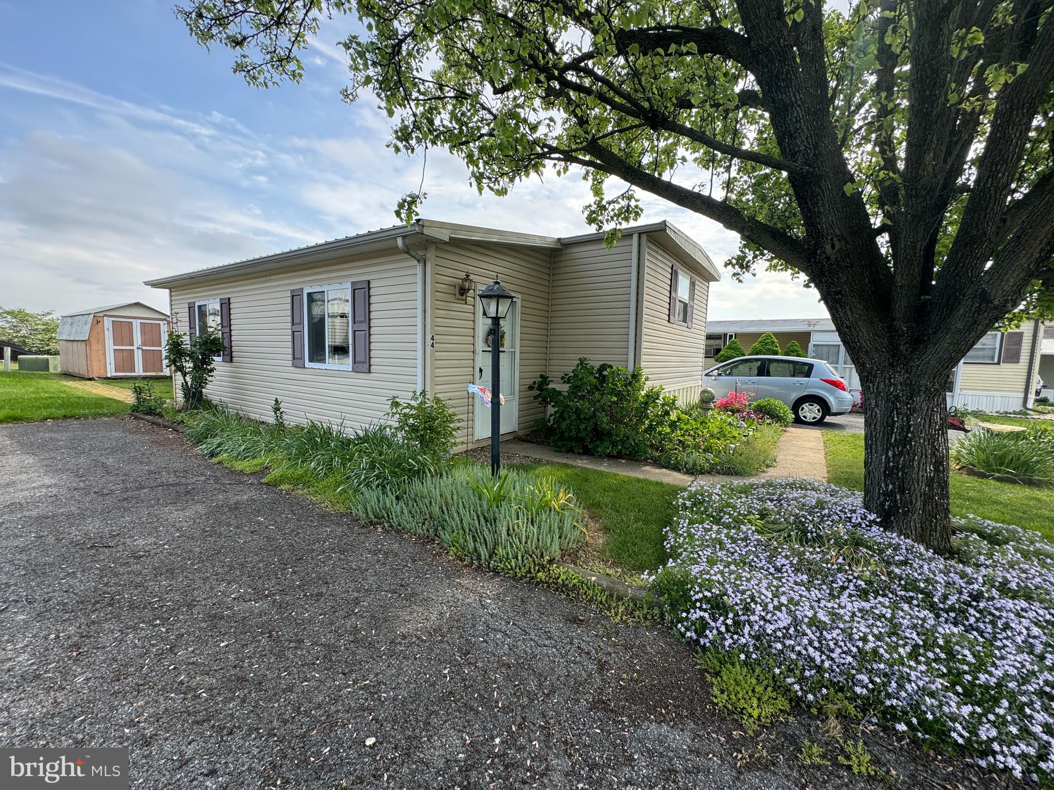 44 Ridgewood Manor Manheim, PA 17545 - Photo 3 of 29 Left side of home. Main entrance. Enclosed Patio