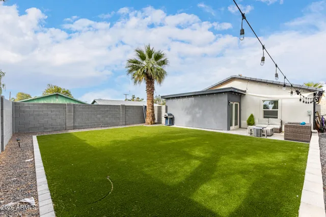 a house view with a garden space