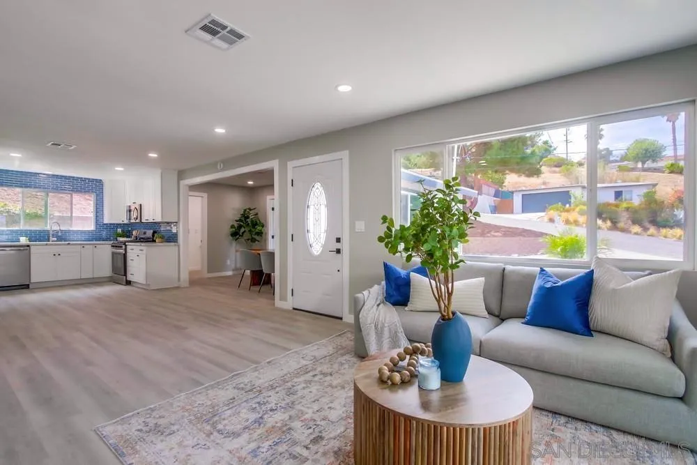 8535 Dobyns Drive Santee, CA 92071 - Photo 13 of 36 a living room with furniture and a potted plant