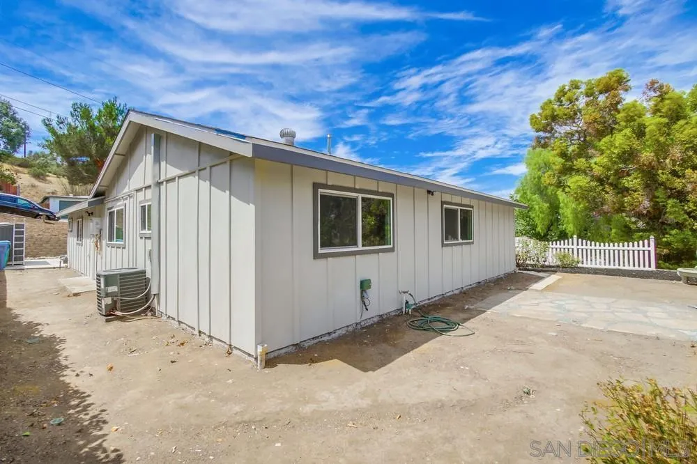 8535 Dobyns Drive Santee, CA 92071 - Photo 33 of 36 a view of a house with a backyard
