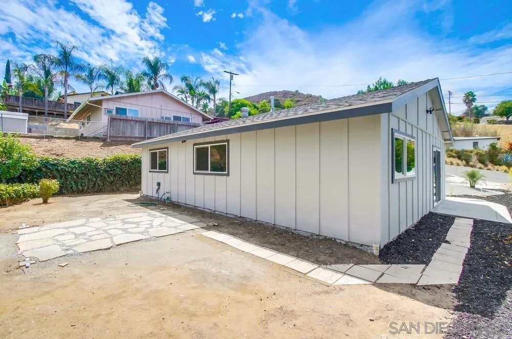 8535 Dobyns Drive Santee, CA 92071 - Photo 34 of 36 a view of a house with a backyard