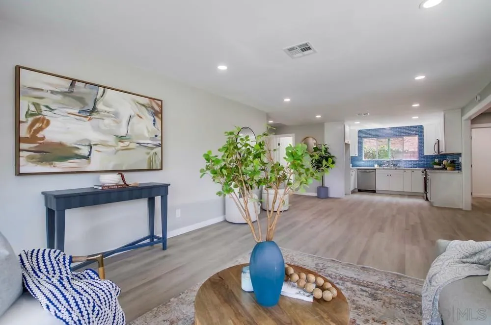 8535 Dobyns Drive Santee, CA 92071 - Photo 6 of 36 a living room with furniture flowerpot and a potted plant