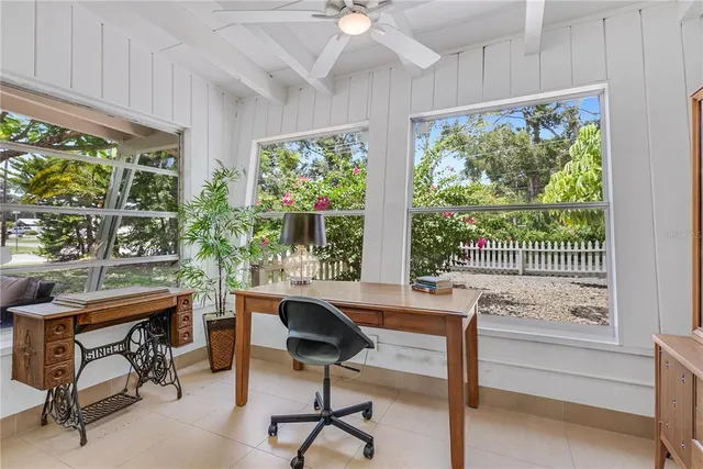 a room with balcony furniture and a window
