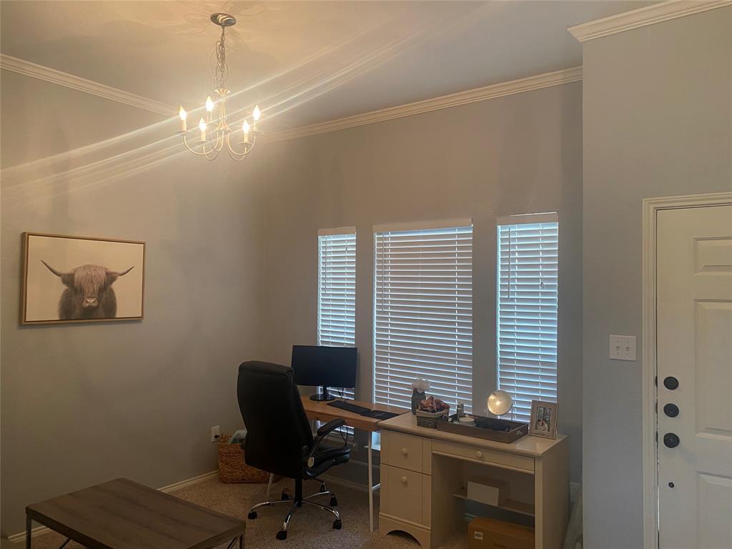 9733 Old Field Drive McKinney, TX 75072 - Photo 3 of 12 a view of a workspace with furniture and a window