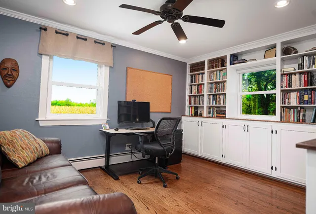 a bathroom with a sink toilet and a mirror