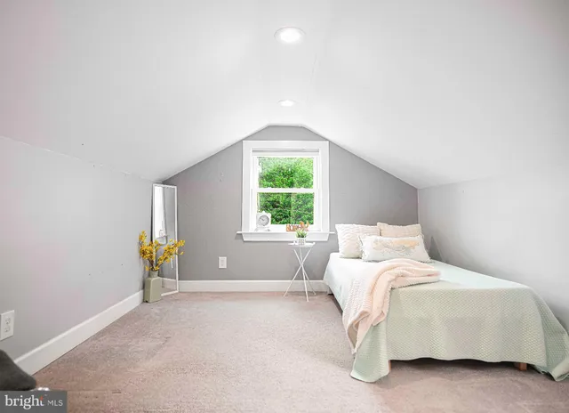 a bathroom with a sink vanity and a mirror