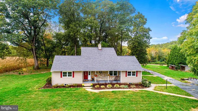 a picture of a bathroom with a shower