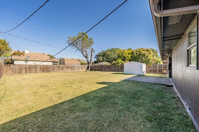 a view of swimming pool with a yard