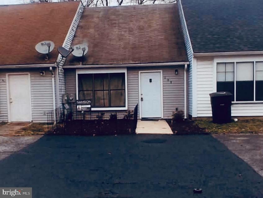 a front view of house with yard and seating