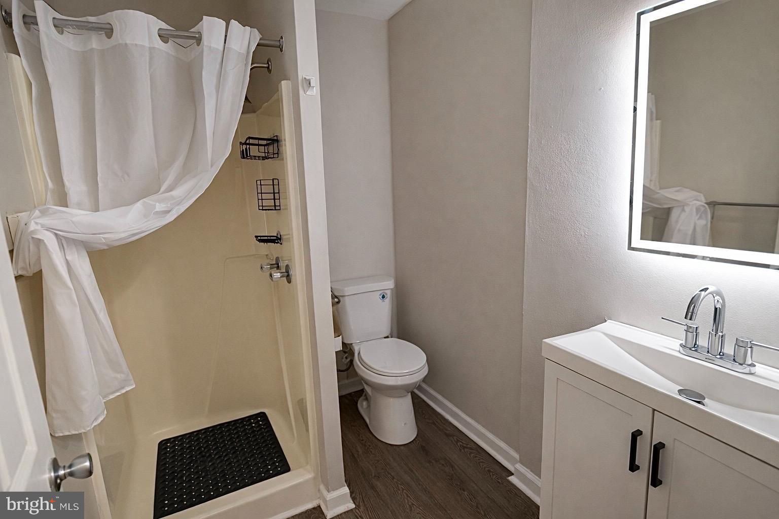 139 Spruance Road Dover, DE 19901 - Photo 12 of 21 a bathroom with a sink and a toilet
