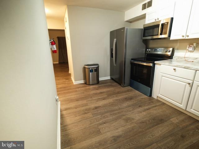 139 Spruance Road Dover, DE 19901 - Photo 2 of 21 a kitchen with stainless steel appliances a refrigerator stove and sink