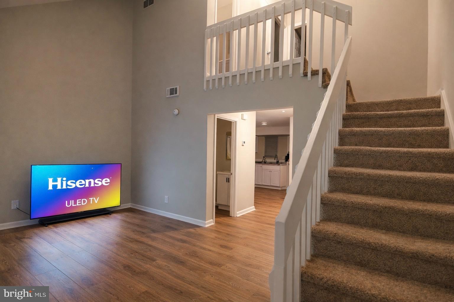 139 Spruance Road Dover, DE 19901 - Photo 6 of 21 a view of an entryway with wooden floor