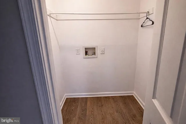 a bathroom with a sink a mirror and vanity