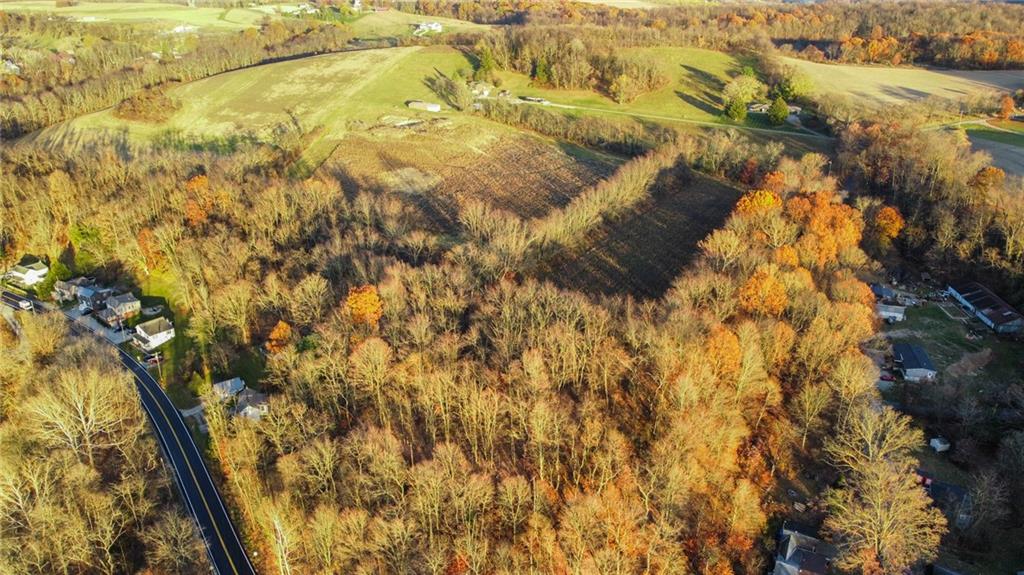 142 Buffalo Hill Road Irwin, PA 15642 - Photo 2 of 7 a backyard of a house with green space