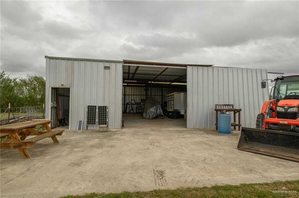30478 Guajardo Road Rio Hondo, TX 78583 - Photo 12 of 26 a view of a car garage