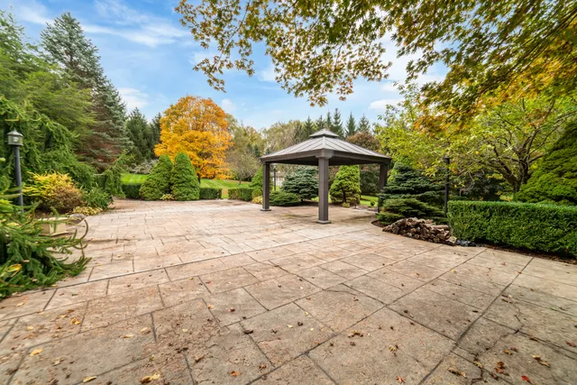 a garden view with a seating space