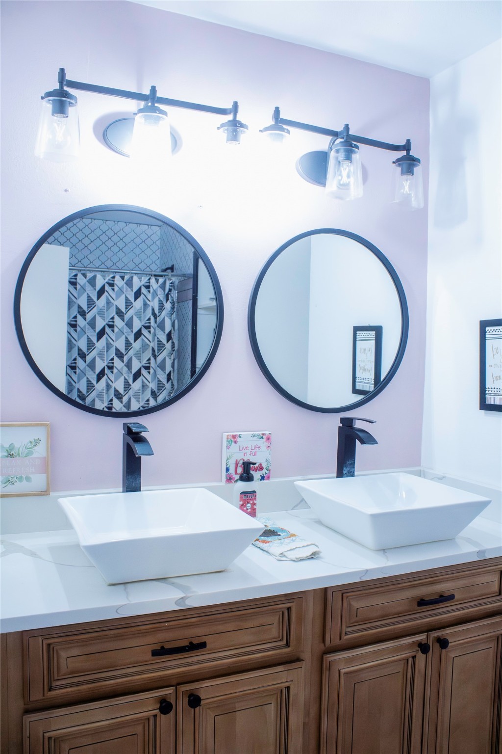 2703 Aspen Road Rosenberg, TX 77471 - Photo 11 of 24 a bathroom with a sink and a mirror
