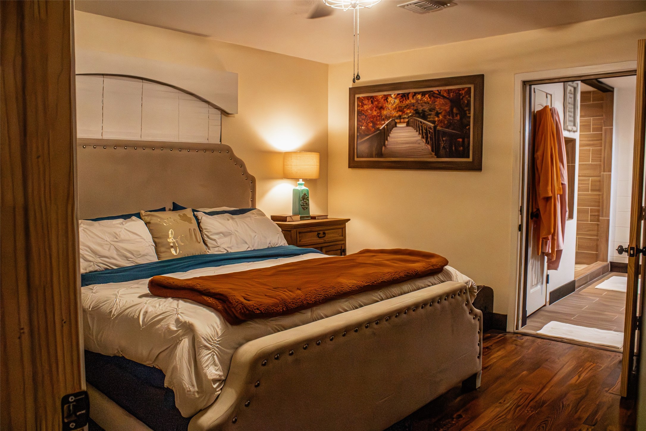 2703 Aspen Road Rosenberg, TX 77471 - Photo 16 of 24 a bedroom with a bed and wooden floor