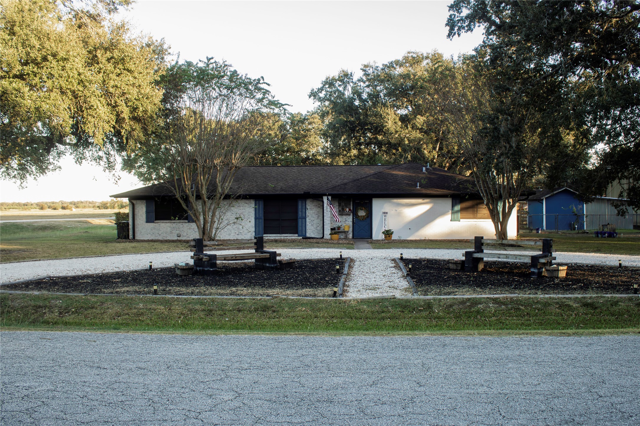2703 Aspen Road Rosenberg, TX 77471 - Photo 3 of 24 a view of a house with a yard and sitting area