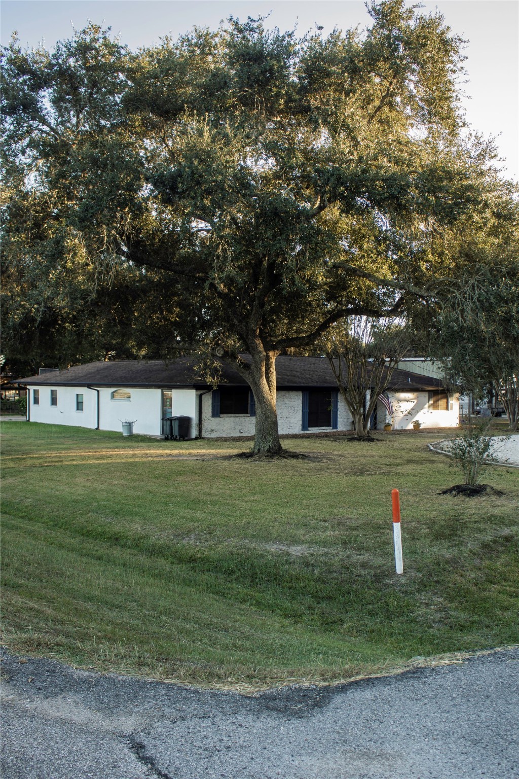 2703 Aspen Road Rosenberg, TX 77471 - Photo 5 of 24 a front view of a house with a garden