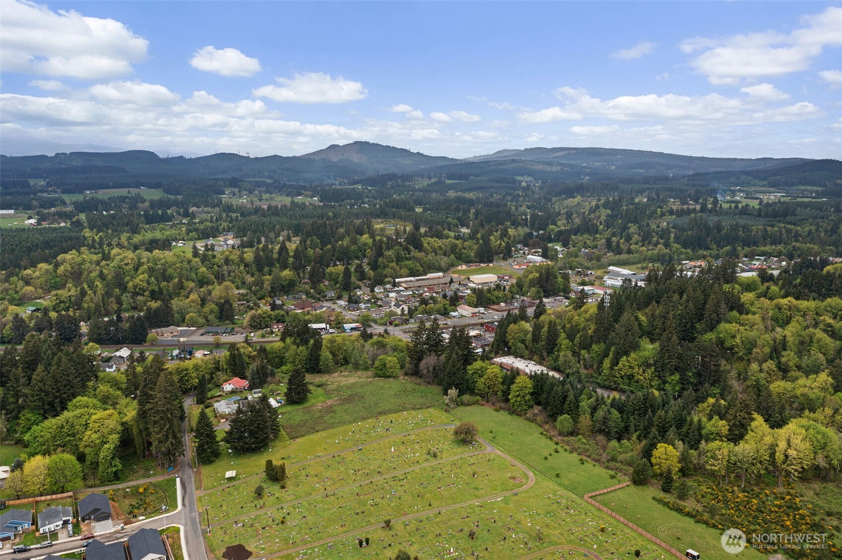 0 Southeast Cowlitz Road Winlock, WA 98596 - Photo 13 of 14 an aerial view of residential houses with outdoor space and trees