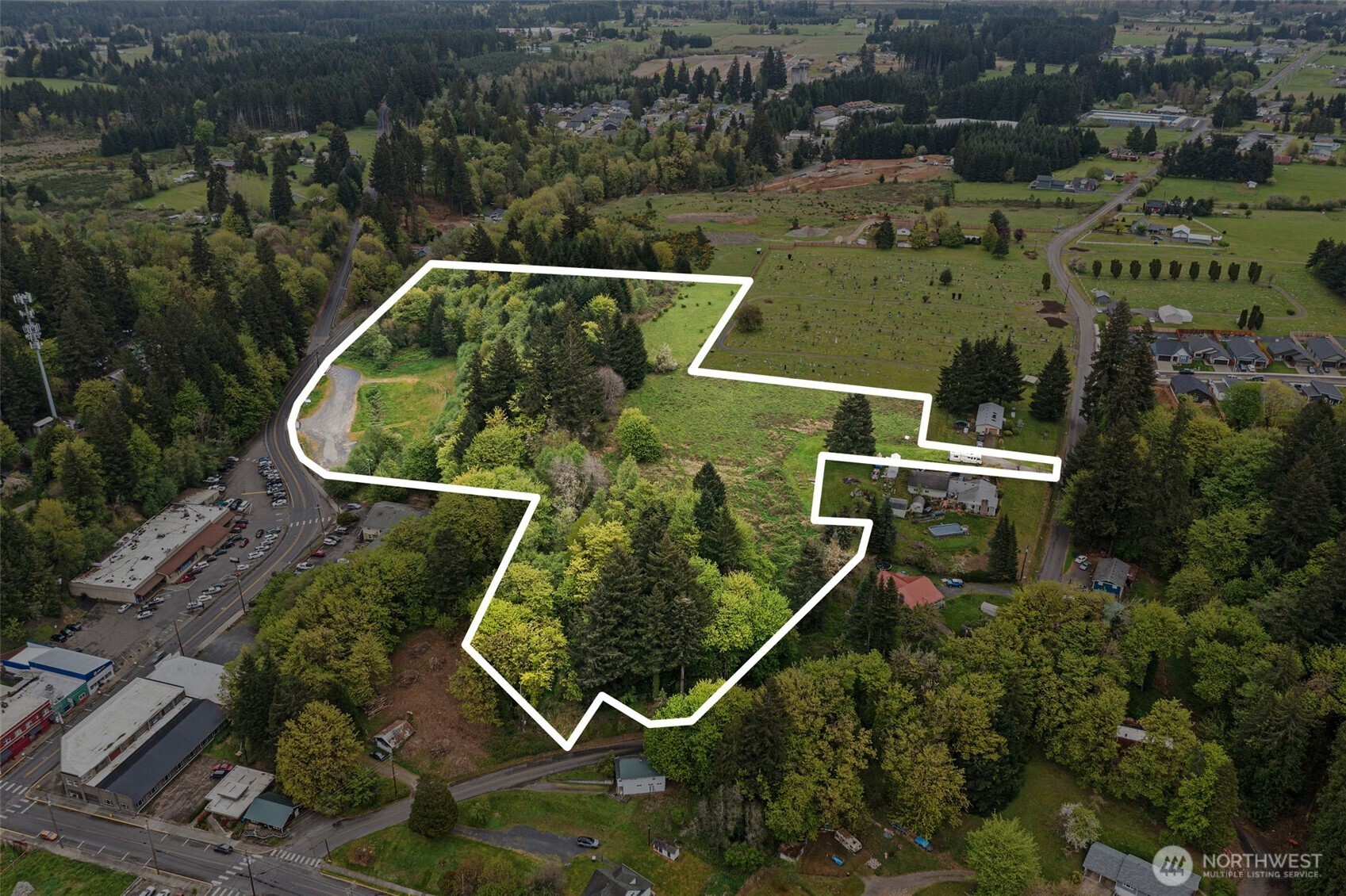 0 Southeast Cowlitz Road Winlock, WA 98596 - Photo 3 of 14 an aerial view of house with a swimming pool