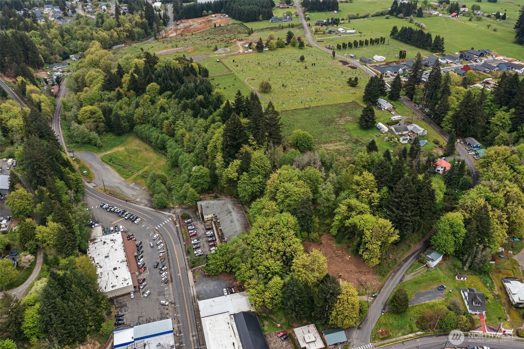 0 Southeast Cowlitz Road Winlock, WA 98596 - Photo 7 of 14 an aerial view of residential houses with outdoor space and trees