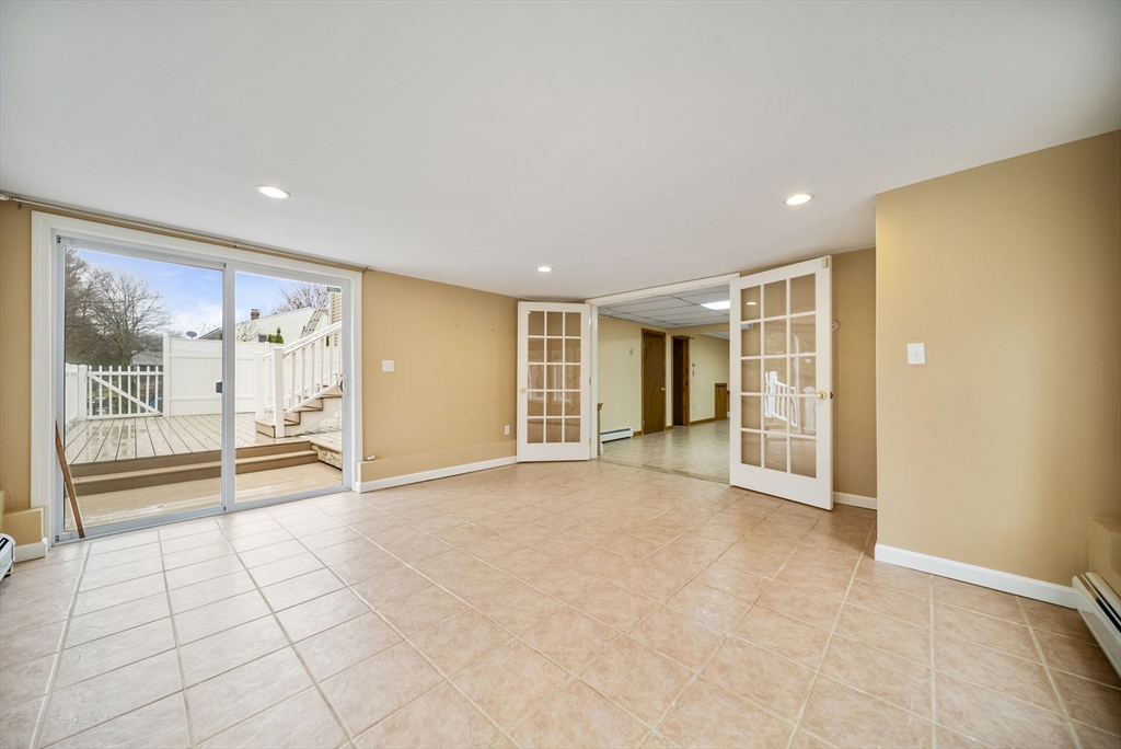 23 Echo Avenue Nashua, NH 03062 - Photo 20 of 38 a view of an empty room with glass door