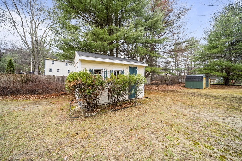 23 Echo Avenue Nashua, NH 03062 - Photo 35 of 38 front view of a house with a yard
