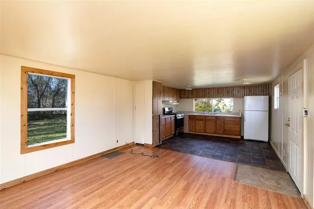 a view of a kitchen and a sink