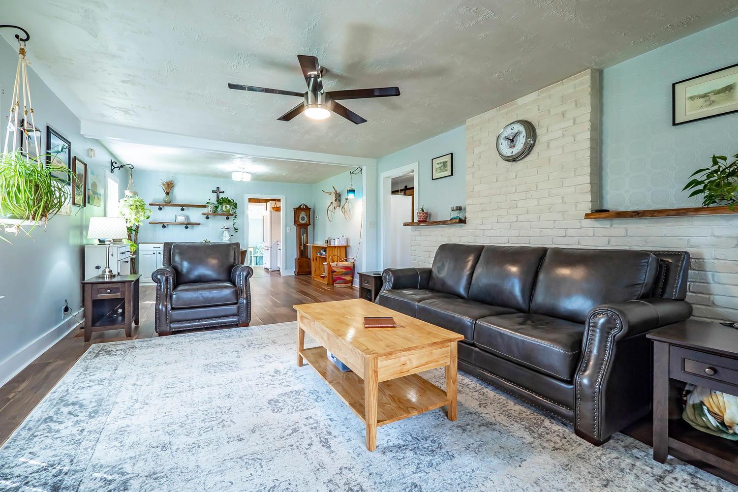 115 Caperton Road Hohenwald, TN 38462 - Photo 7 of 29 Custom Brick interior in the living room