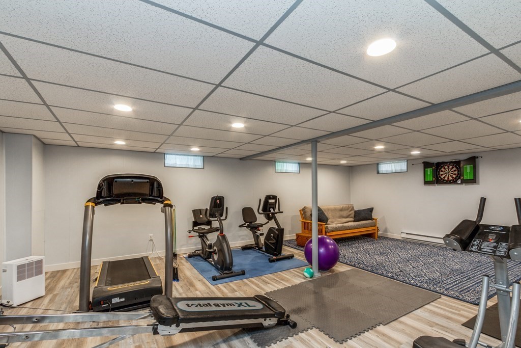 494 South Meadow Road Lancaster, MA 01523 - Photo 20 of 36 a view of a room with gym equipment