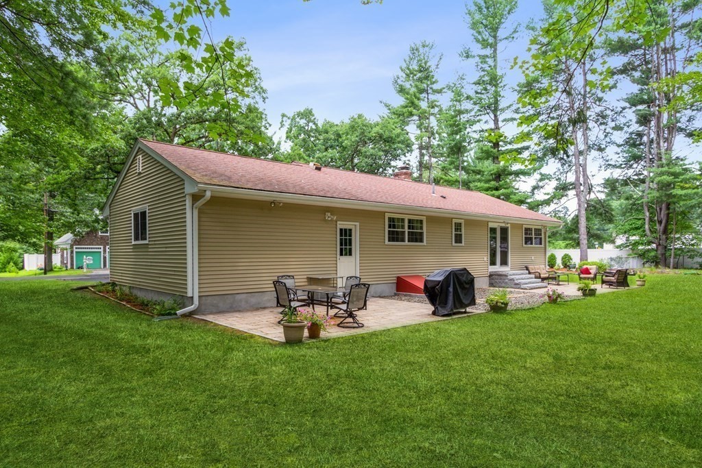 494 South Meadow Road Lancaster, MA 01523 - Photo 28 of 36 a front view of house with yard and outdoor seating