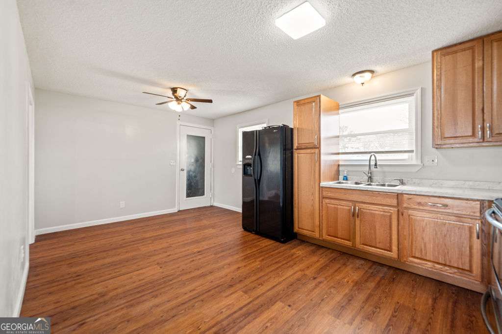 31 Jackson Way Fort Oglethorpe, GA 30742 - Photo 13 of 51 a view of a kitchen with a sink cabinet and a window