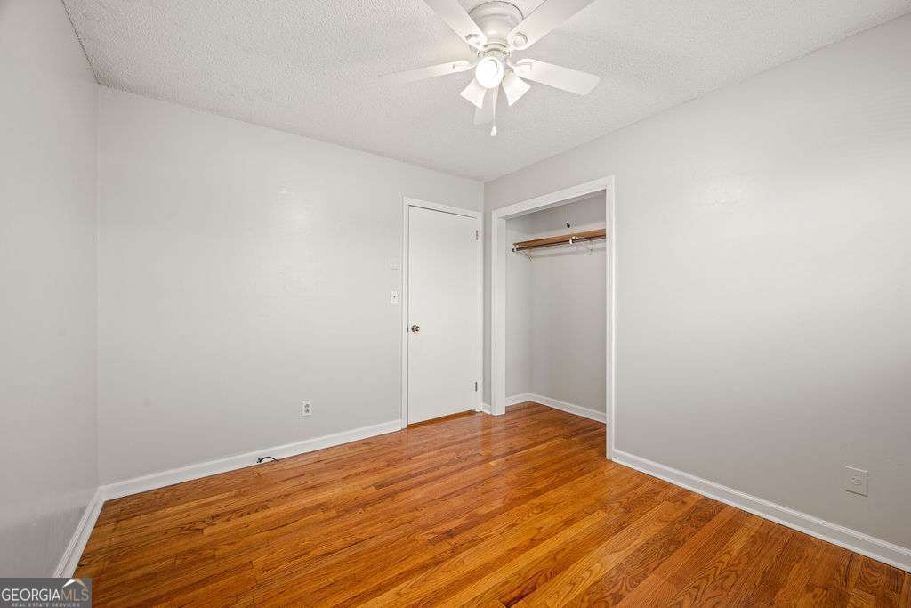 31 Jackson Way Fort Oglethorpe, GA 30742 - Photo 19 of 51 a view of a big room with wooden floor and closet