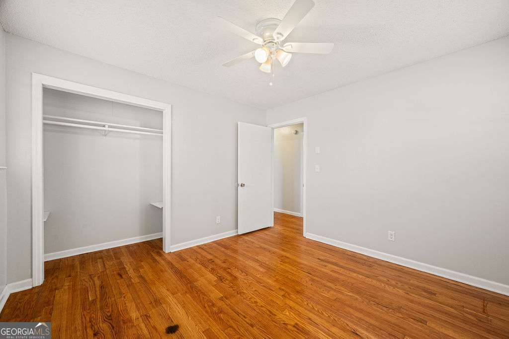 31 Jackson Way Fort Oglethorpe, GA 30742 - Photo 23 of 51 a view of an empty room with wooden floor